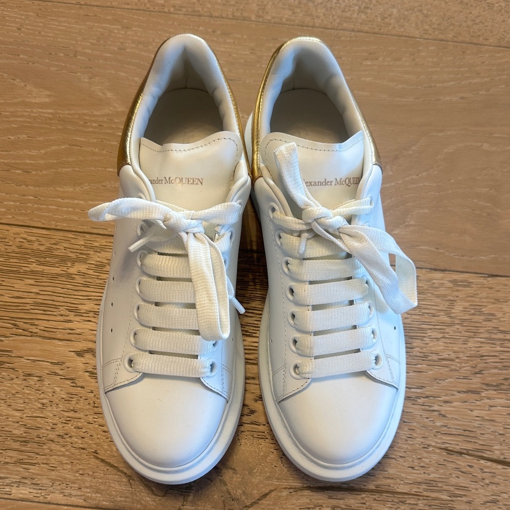 Alexander McQueen White Sneakers with Gold Highlights